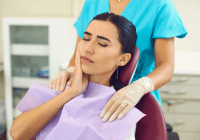 Woman with tooth pain